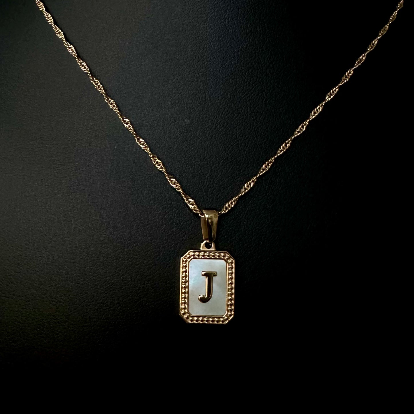 CUSTOM INITIAL
